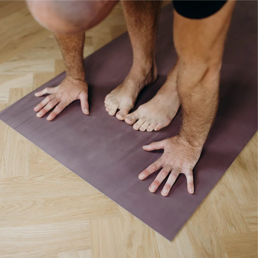 Grounding through hands and feet on the mat