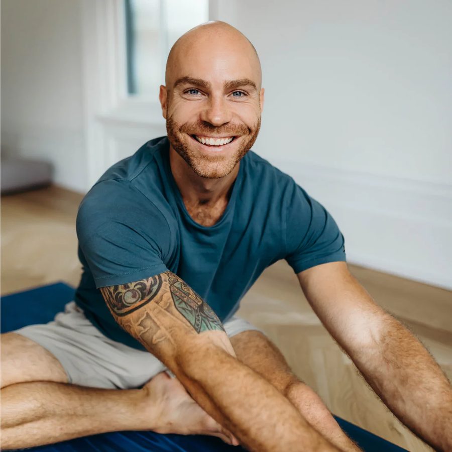 Anthony Berlingeri in a seated Hatha Yoga posture